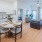 a large kitchen with a dining table