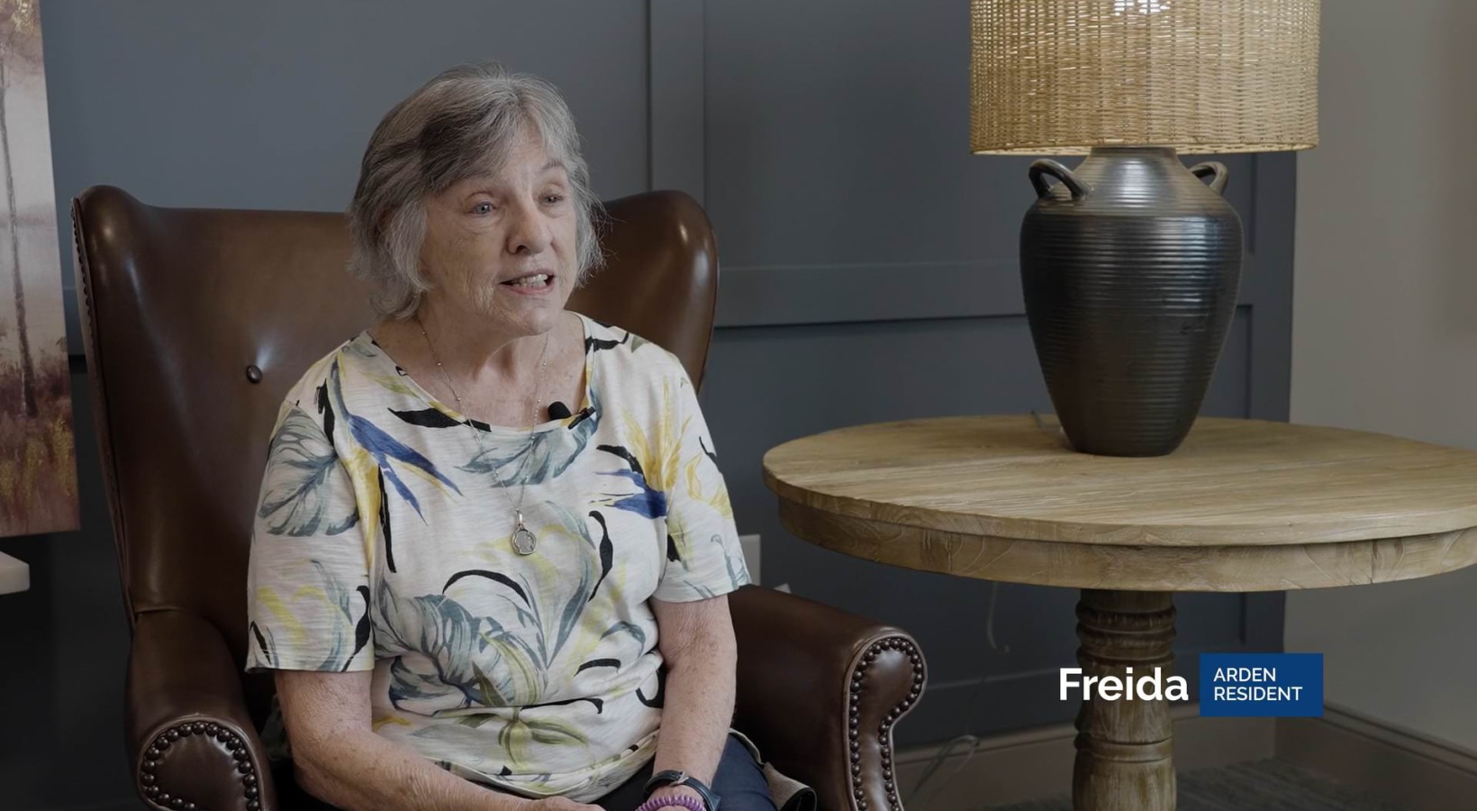 Frieda a person sitting on a chair