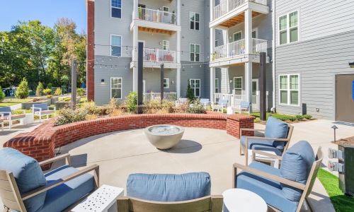 Everything within reach a patio with chairs and tables outside a building
