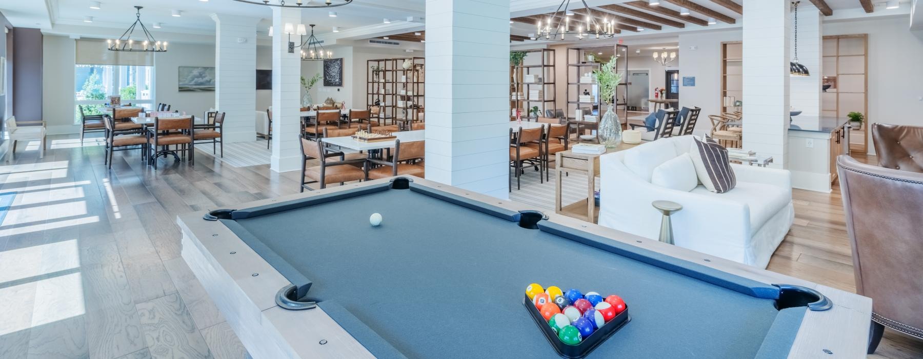 a pool table in a large room