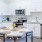 a kitchen with white cabinets
