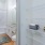 a bathroom with a white shower